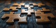 © Vibrant Visions Pixe - Wooden Jigsaw Puzzle Pieces Interlocking on a Dark Wooden Surface