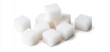 © JP STUDIO LAB - Isolated sugar cubes on white background, close-up, sharp edges, simple and clean design, representing purity and sweetness