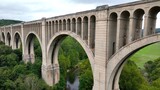 The Tunkhannock Creek Viaduct is a historic railroad bridge in Pennsylvania, renowned for being the world’s largest reinforced concrete bridge completed in 1915