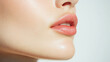 © VERTEX SPACE - A close up of womans lips showcases soft, natural look with subtle pink hue. smooth skin and gentle shine create an inviting and fresh appearance