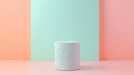 Canvas Print - A simple yet elegant cylinder pedestal sits on a backdrop of pastel pink and mint green, creating a visually appealing and modern display for product photography.