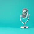 © Jammy - Vintage microphone on a teal background, perfect for audio and music themes.
