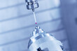 © Parilov - Coordinate measuring machine probe CMM with sensor control quality of metal parts by CNC, blue toning