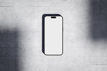 Wall Mural - Phone with a blank screen on a concrete background