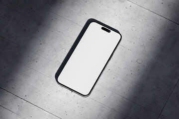 Wall Mural - Phone with a blank screen on a concrete background
