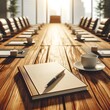 © pavenavach - Close up of wooden boarding table with empty notepad and pen for morning notes. Blurry chairs in the background. Business meeting concept. Mock up place, 3D Rendering