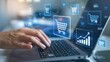 © BoOm - A close-up of a hand using a laptop, showcasing digital shopping cart icons and growth charts, illustrating modern online shopping and e-commerce trends.