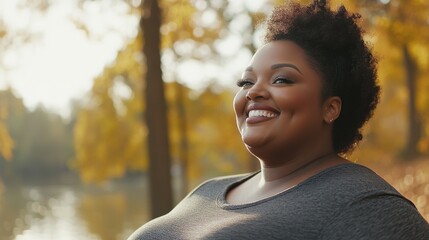 Poster - A smiling woman standing near a lake or sea shore, perfect for use as a background image or illustration