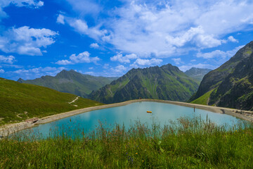 Wall Mural - Lake at Innere Parpfienzalpe in the Brandnertal, State of Vorarlberg, Austria