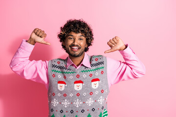 Canvas Print - Photo of nice young man point fingers himself self wear christmas vest isolated on pink color background