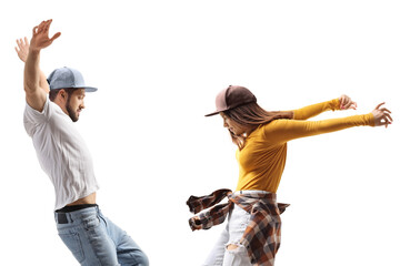 Female and male dancer in casual clothes dancing on tiptoes