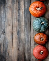 Sticker - Colorful pumpkins on rustic wooden background