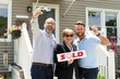© Kat Schleicher/Stocksy - Gay Couple Celebrating Home Purchase