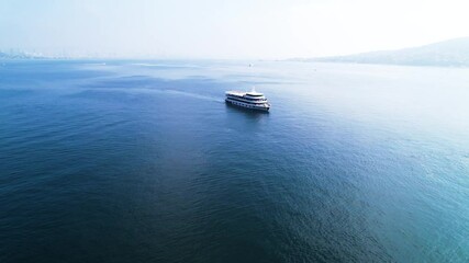 Wall Mural - Ferry on Istanbul. Ferry sailing in Istanbul Bosphorus. Istanbul, Turkey.