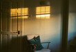 © Helen Rushbrook/Stocksy - Patches of sunlight on the wall of a home