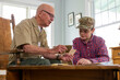 © Raymond Forbes LLC/Stocksy - Senior Veteran family Great Grandfather  with Grandson