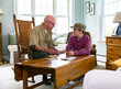 © Raymond Forbes LLC/Stocksy - Senior Veteran family Great Grandfather  look at photos