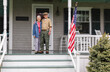 © Raymond Forbes LLC/Stocksy - Senior Veteran Portrait at home  with wife
