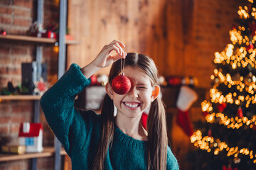 Poster - Photo of charming little girl have fun cover eye ball devor dressed green christmas garment tradition atmosphere decor house indoors room