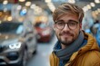 © Matvejs - Young man explores options for a new vehicle at a car dealership to find the perfect fit