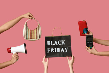 Poster - Hands with payment terminal, shopping bag, megaphone and accessories on pink background. Black Friday sale