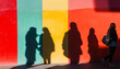 © mai - Shadows of people against brightly colored walls, letting the shadow tell the story