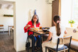 © Diego Martin/Stocksy - Family Enjoying Lunch Together at Korean Asian Restaurant