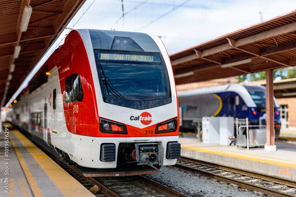 Selective focus on Caltrain electric commuter train at Diridon Station ...