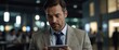 © HumblePride - Focused Executive: A serious businessman reviews documents on his tablet in a modern office setting.  The image exudes professionalism and attention to detail.