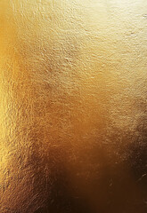 Wall Mural - Gold textured background golden foil metallic sheet or paper for advertising campaign and animation 