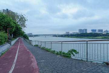 Wall Mural - Urban riverfront architecture and bridges across rivers