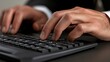 © BerkahStock - Close-up of hands typing on a keyboard, emphasizing productivity and technology use.