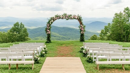 Sticker - A scenic outdoor wedding setup with chairs, an arch, and mountain views.