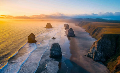 Wall Mural - Stunning coastal cliffs at sunset with rock formations in the sea.