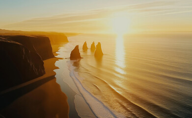 Wall Mural - Stunning coastal cliffs at sunset with rock formations in the sea.