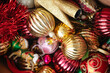© Luis Herrera/Stocksy - closeup of christmas ornaments