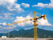 © ma yic/Stocksy - Yellow construction tower
