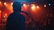 © batara - Silhouetted Musician Performing on Stage