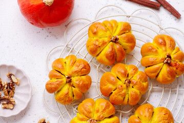 Wall Mural - Pumpkin-shaped buns with apple and pumpkin filling.