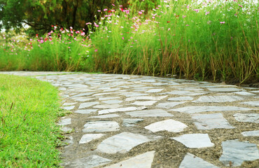 Wall Mural - stone pathway in the flowering garden