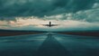 © 69 - A dramatic shot of an airplane lifting off from the airport runway, capturing the thrilling moment of takeoff with the horizon in the background