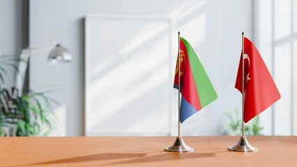 FLAGS OF ERITREA AND TURKEY ON TABLE