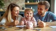 © Somboon - Family money management: A young family sitting at a table, tracking expenses and savings for their future goals