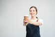 © NINENII - Overjoyed charming excited caucasian woman business woman worker using smartphone feeling happy to empty copy space isolated on background.