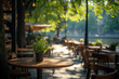 © Vovmar - Summer outdoor cafe. Empty table in a cafe on the embankment in French style.