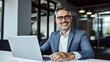 © halo - businessman working on a laptop