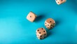 © Jesus - roll the dice throwing and rolling wooden dice on a blue background