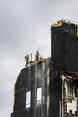 Wall Mural - Tall tower construction being demolished.