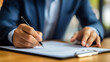 © adynue - Businessman sign contract, agreement, mortgage, insurance or another document