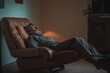 © Fotograf - A person is lounging in a reclining chair in a cozy living room